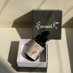 Swastik leg cramps oil bottle in premium packaging showing natural formulation for circulation support and leg comfort