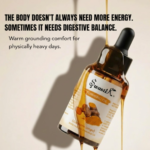 Premium Swastik Turmeric Essential Oil bottle with luxury wellness messaging focused on digestive balance, grounding comfort, and physically heavy days.